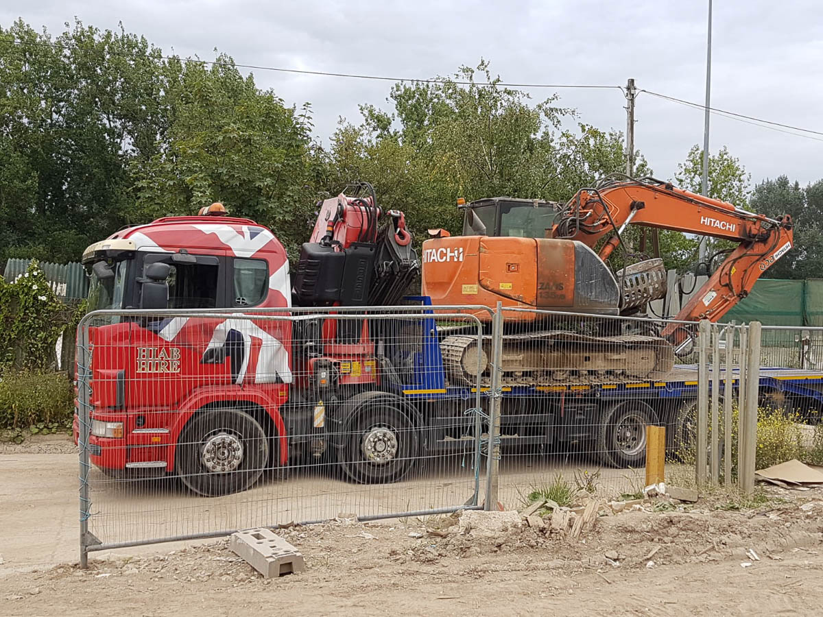 Transporting an excavator machine