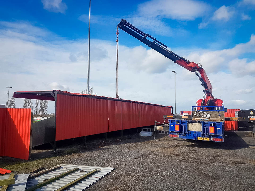 Lifting panels after Storm Dennis damages Sheppey Utd stadium